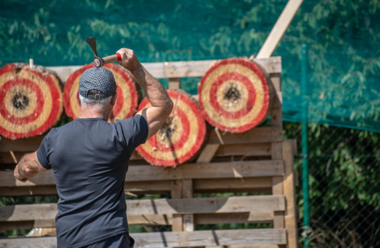A man is ready for throwing axe on competition.